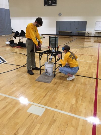 Two Students Testing a boomilever
